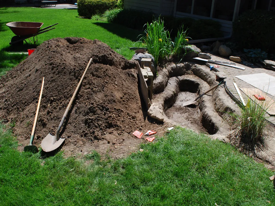Digging a backyard pond - Grass Roots Pond And Garden Digging a backyard pond