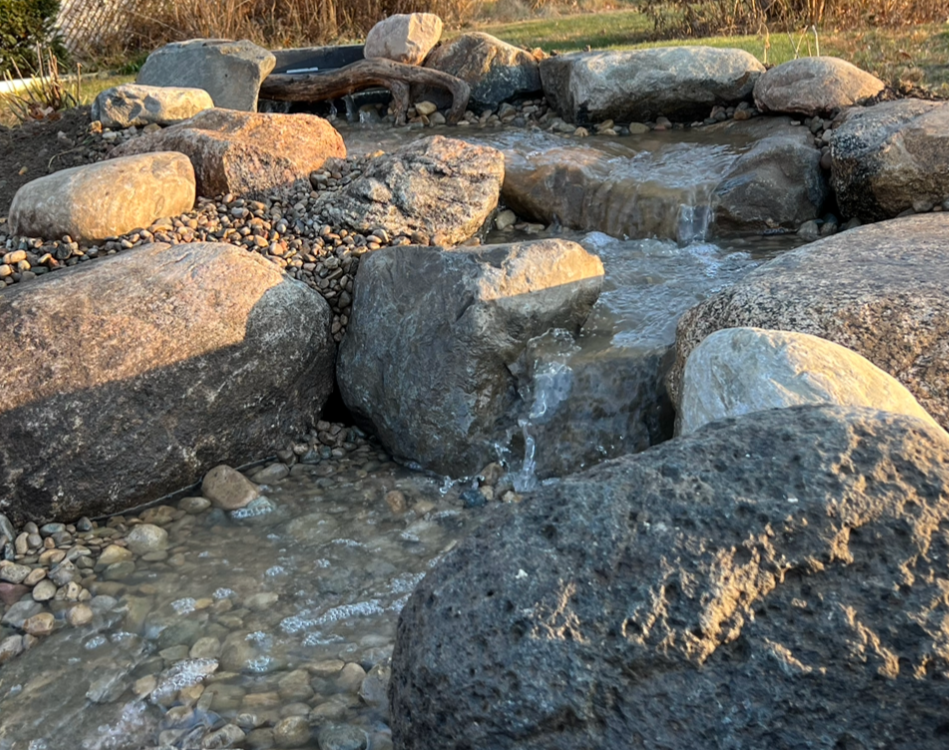 Beautiful-waterfall-feature-constructed-by-Grass-Roots - Grass Roots Pond And Garden Beautiful waterfall feature constructed by Grass Roots