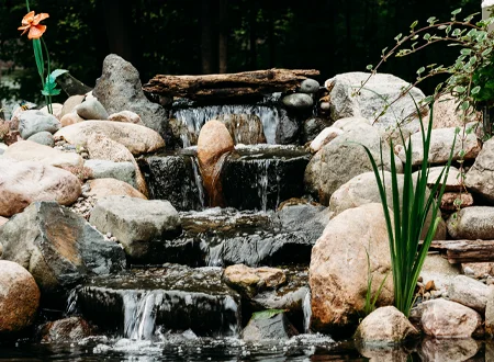front door falls pondless waterfall - Grass Roots Pond And Garden - Grass Roots Pond And Garden front door falls pondless waterfall